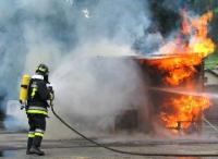 compattatore incendiato