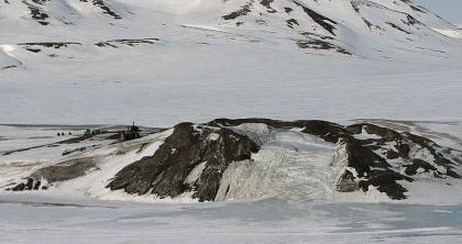 svalbard drilling opera on waterfall pingo